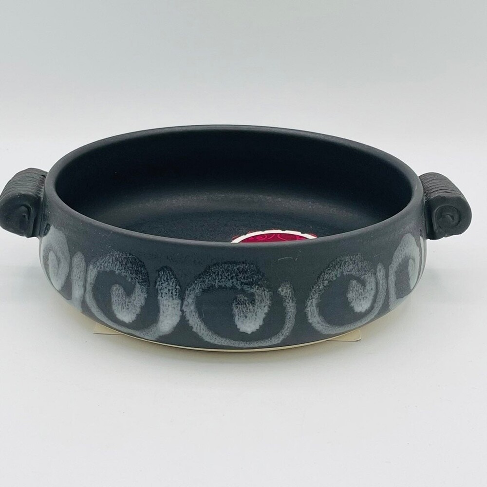 Black and white swirl glazed handmade baking dish by Jan's Pottery gouda recipe
